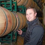 Jason in the barrel room sampling wine